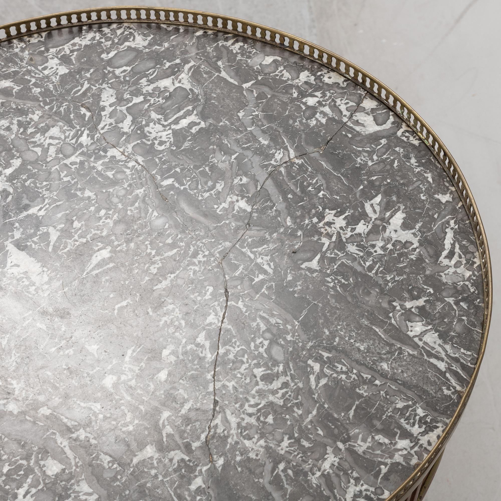 A Louis XVI-style table end of the  19th Century.