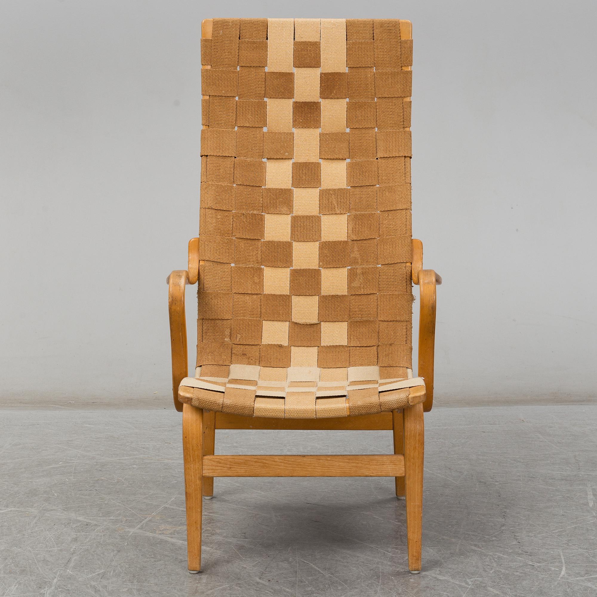 A armchair, model "Eva hög", designed by Bruno Mathsson for Firma Karl Mathsson, dated 1941.
