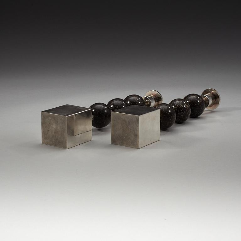 Sigurd Persson, a pair of silver plated and porphyry candlesticks, Sweden.