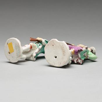 Two Meissen porcelain figures of huntsmen, 18th Century.