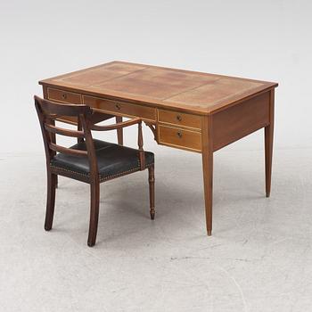 A Gustavian style writing desk and chair, 20th century.