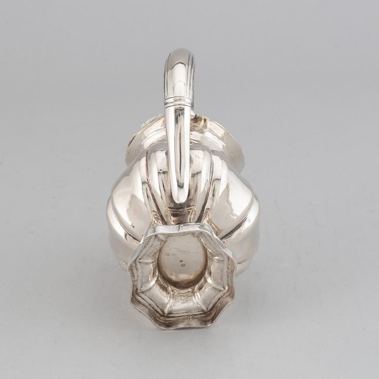 A Russian 19th century parcel-gilt silver cream-jug, mark of Abraham Forstedt, St. Petersburg 1840.