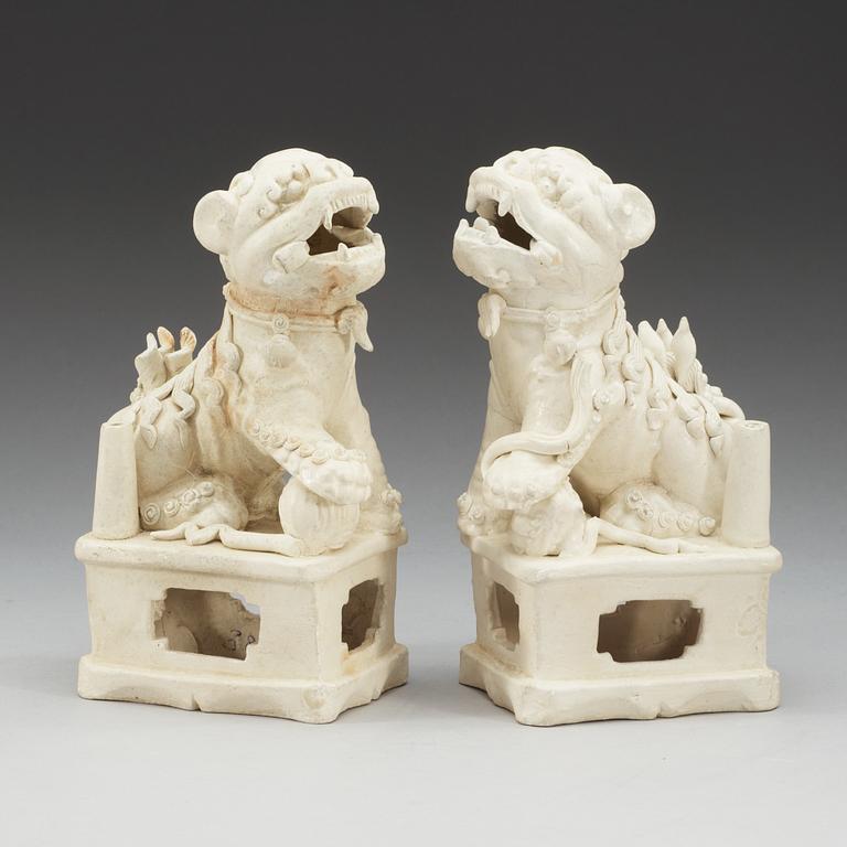 A pair of blanc de chine joss stick holders, Transition, 17th Century.