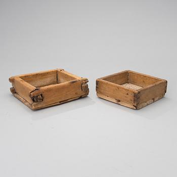 Two Finnish 18th/19th century wooden cheese moulds.