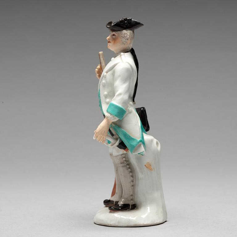 A German unmarked porcelain figure of a huntsman, 18/19th Century.