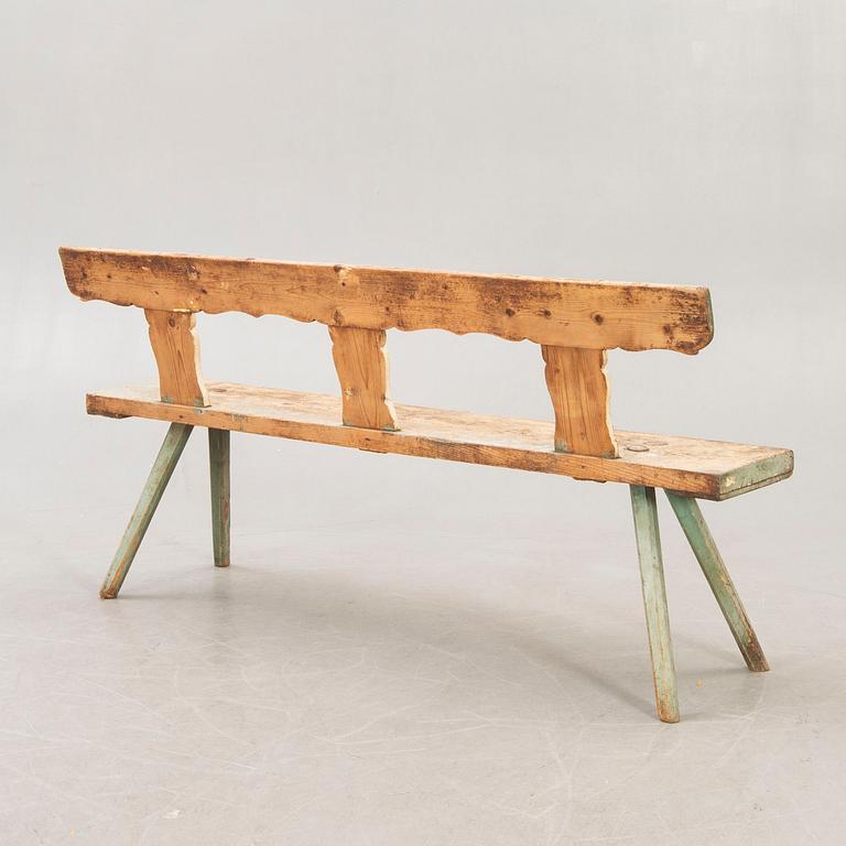 A painted early 1900s bench.