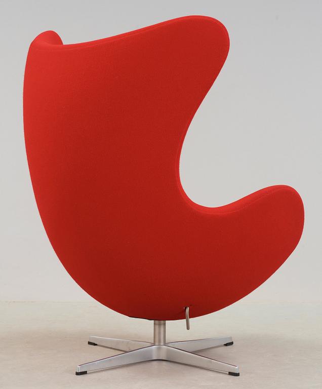 An Arne Jacobsen red leather 'Egg' chair, Fritz Hansen, Denmark 2002.