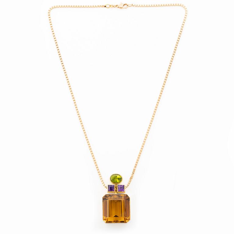 Kristian Nilsson, hänge 18K guld med en fasettslipad citrin, ametist pch peridot. Stockholm, 1986.