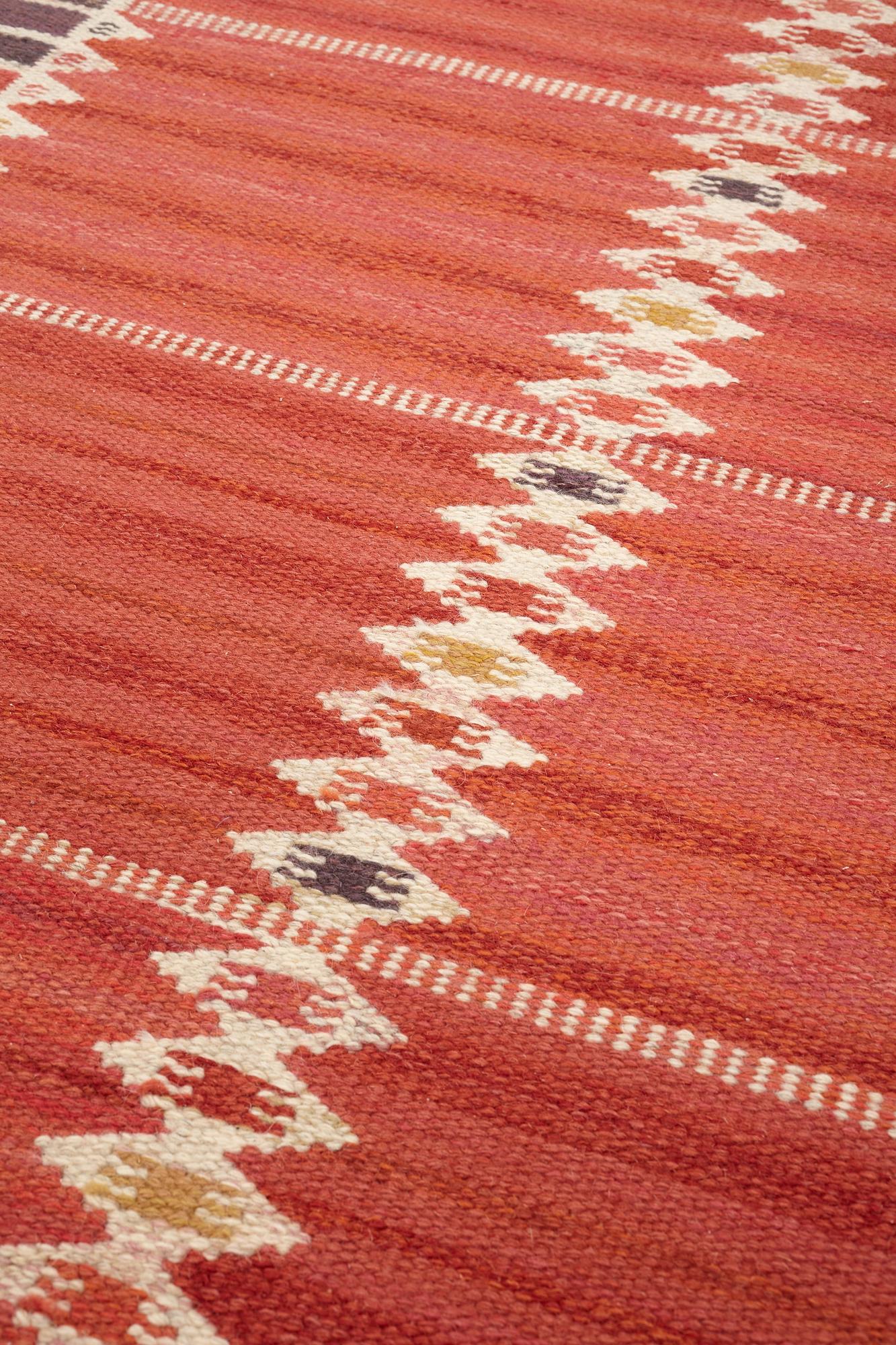 Barbro Nilsson, A CARPET, "Salerno kallröd med enkel bård", flat weave, ca 217 x 149,5 cm, signed AB MMF BN.