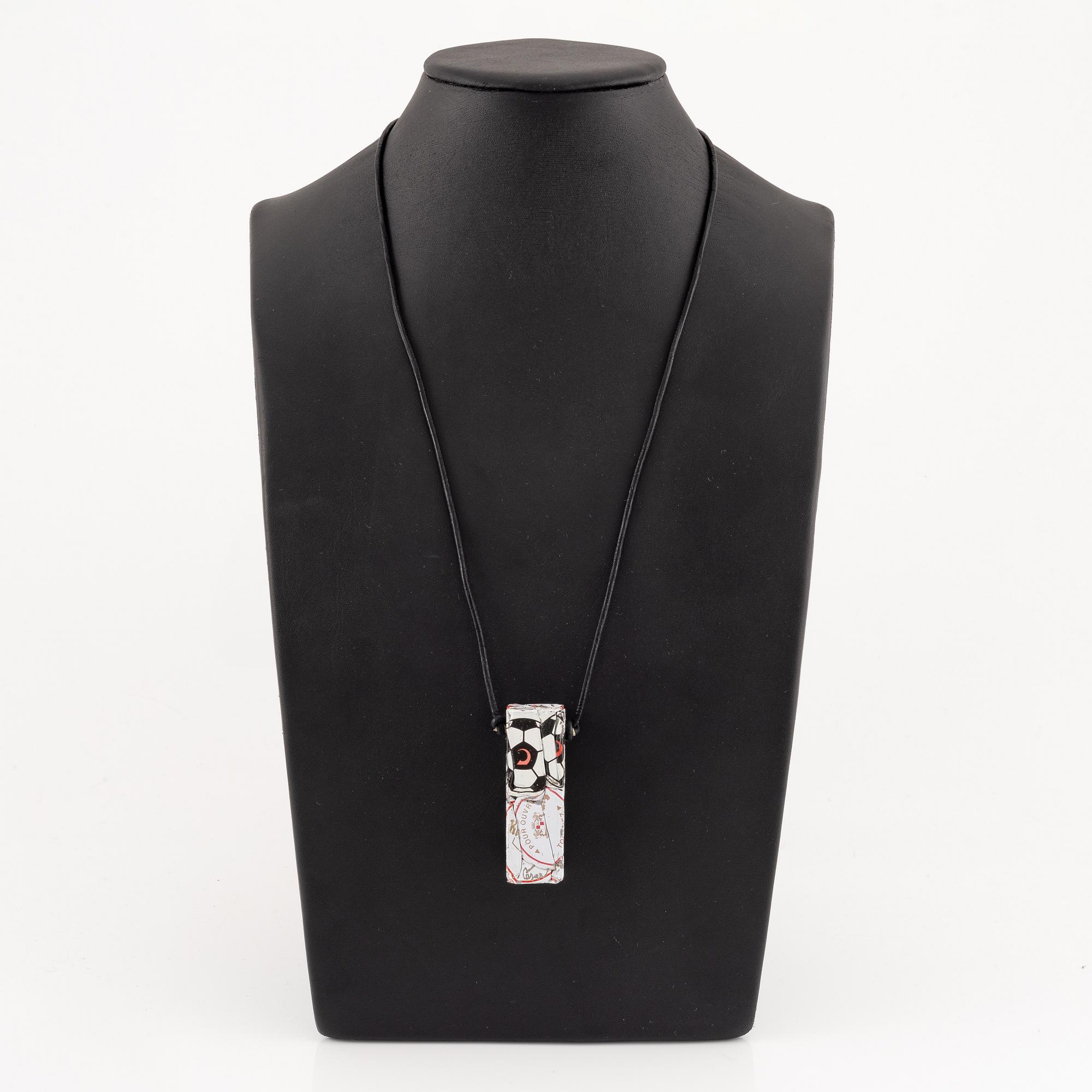 César Baldaccini, compression, pendant made of compressed beer bottle caps.