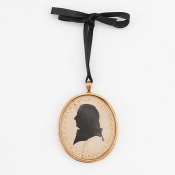 A late-gustavian silhouette portrait in an 18k gold frame by Erik Ytterbom, Stockholm 1805.