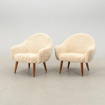 Armchairs, a pair from the mid-20th century.