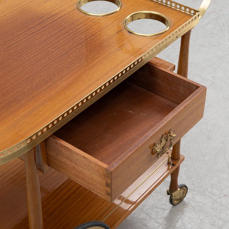 A mahogany-veneered serving trolley, mid 20th Century.