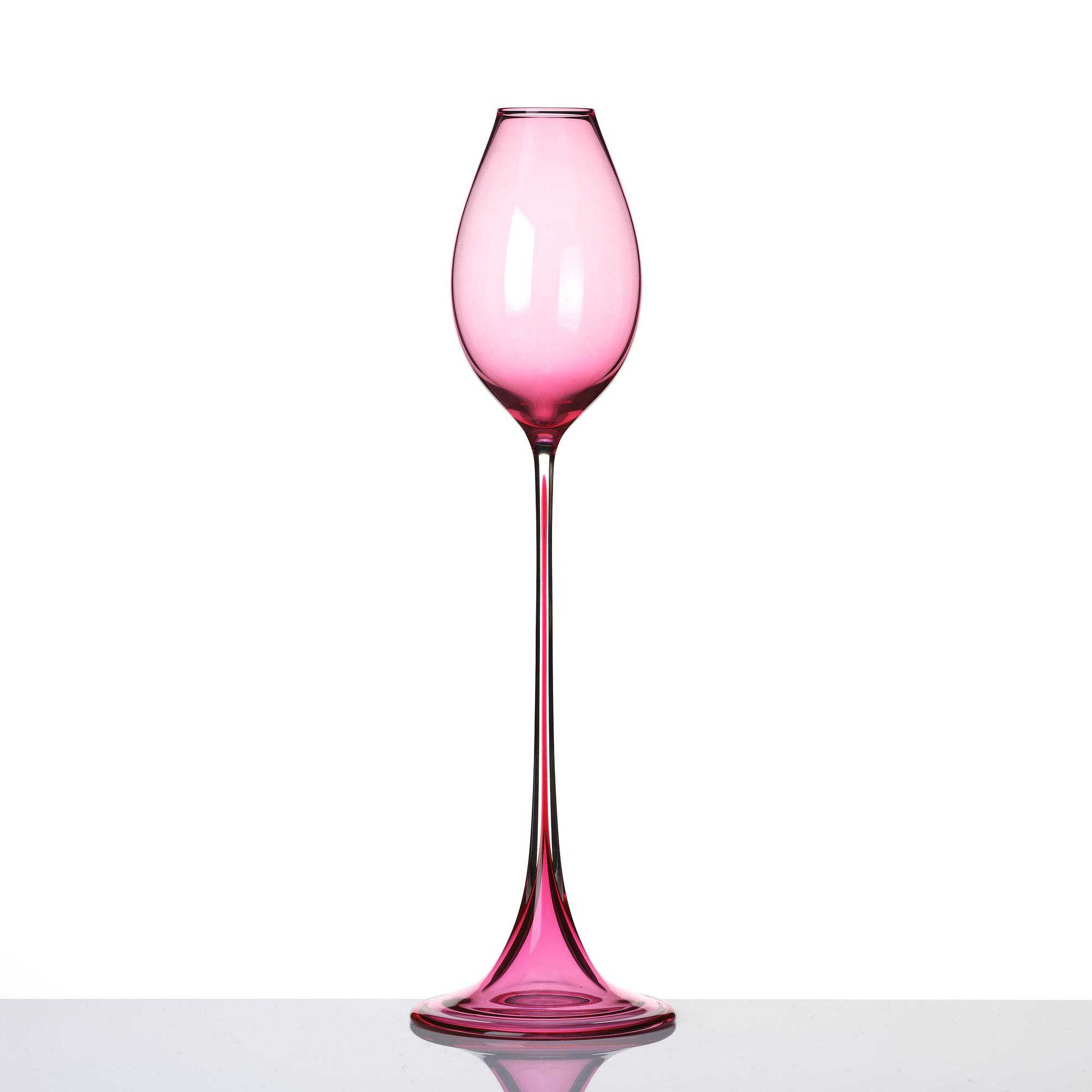 Nils Landberg, a cerise tinted glass goblet, Orrefors Sweden 1957.