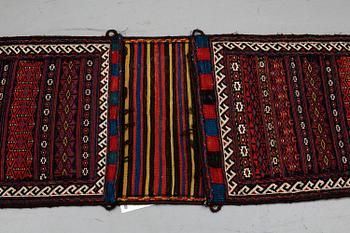 A baluch saddelbag, probably, circa 154 x 63 cm.