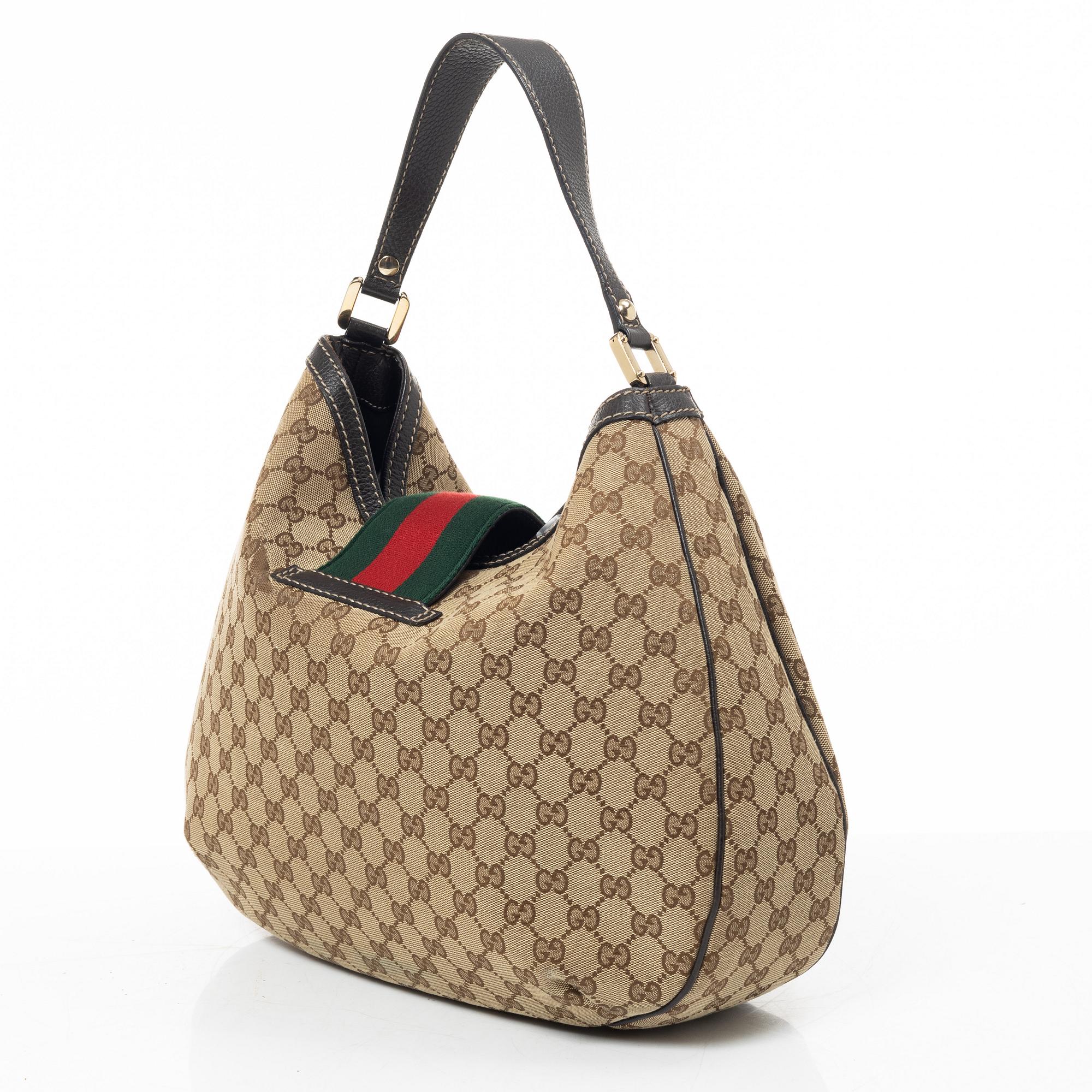 Gucci, GG Supreme bag.