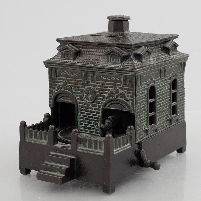 A mechanical bank, late 19th century, probably by Judd Manuf. Comp.