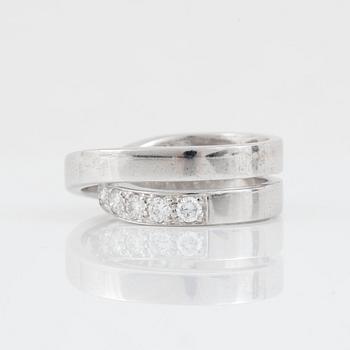 A brilliant-cut diamond ring, signed Cartier.