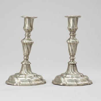 A pair of Rococo pewter candlesticks by Johan Anjou (Gävle 1763-1808/10).