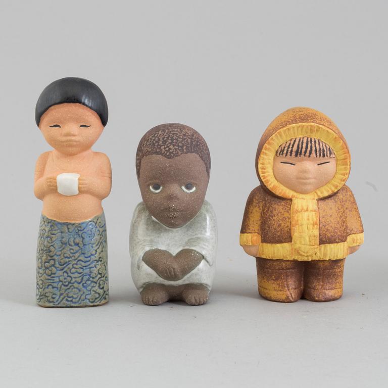 A collection of six stonewear figurines from the series "All världens barn" by Lisa Larson for Gustavsberg.