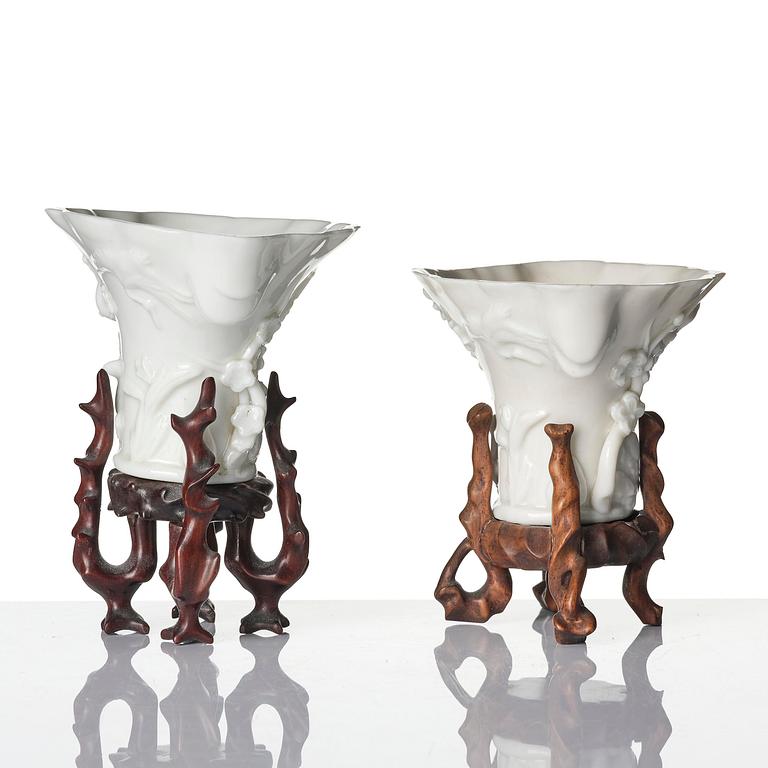 A pair of blanc de chine rhinoceros libation cups, Qing dynasty, Kangxi (1662-1722).