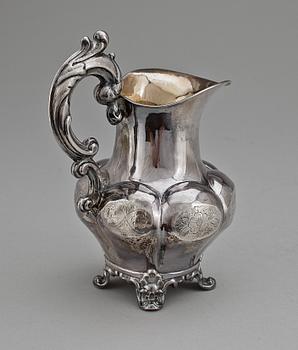 GRÄDDKANNA, silver, nyrokoko, Johan Olof Östlund, Gällivare 1865. Vikt ca 168 g.