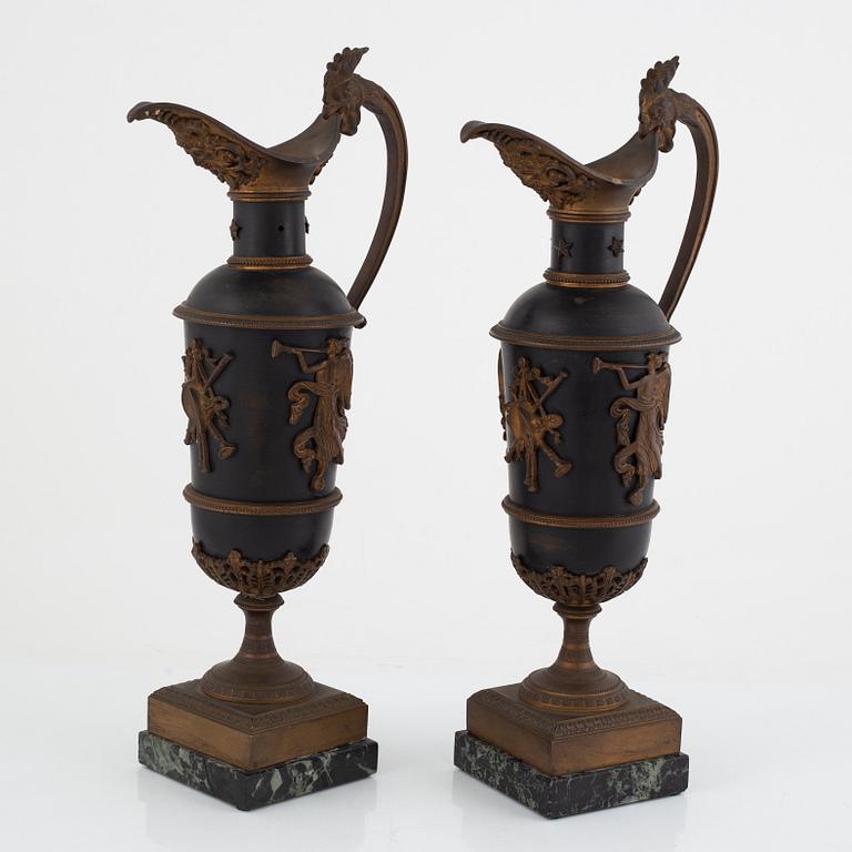 A pair of empire style decoration urns, 19th century.