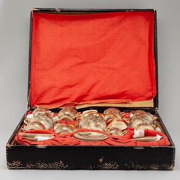 An earthenware teaset in box from the turn of the century 1900.