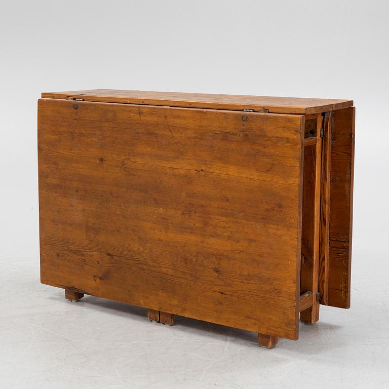 A 19th century gate-leg table.