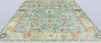 A rug, Ziegler design, approx. 290 x 235 cm.