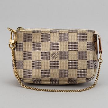LOUIS VUITTON, A 'Mini Pochette Accessoires' and a shoulder strap.