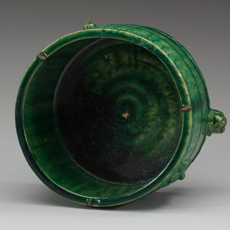 A green glazed tripod censer, presumably Han dynasty.
