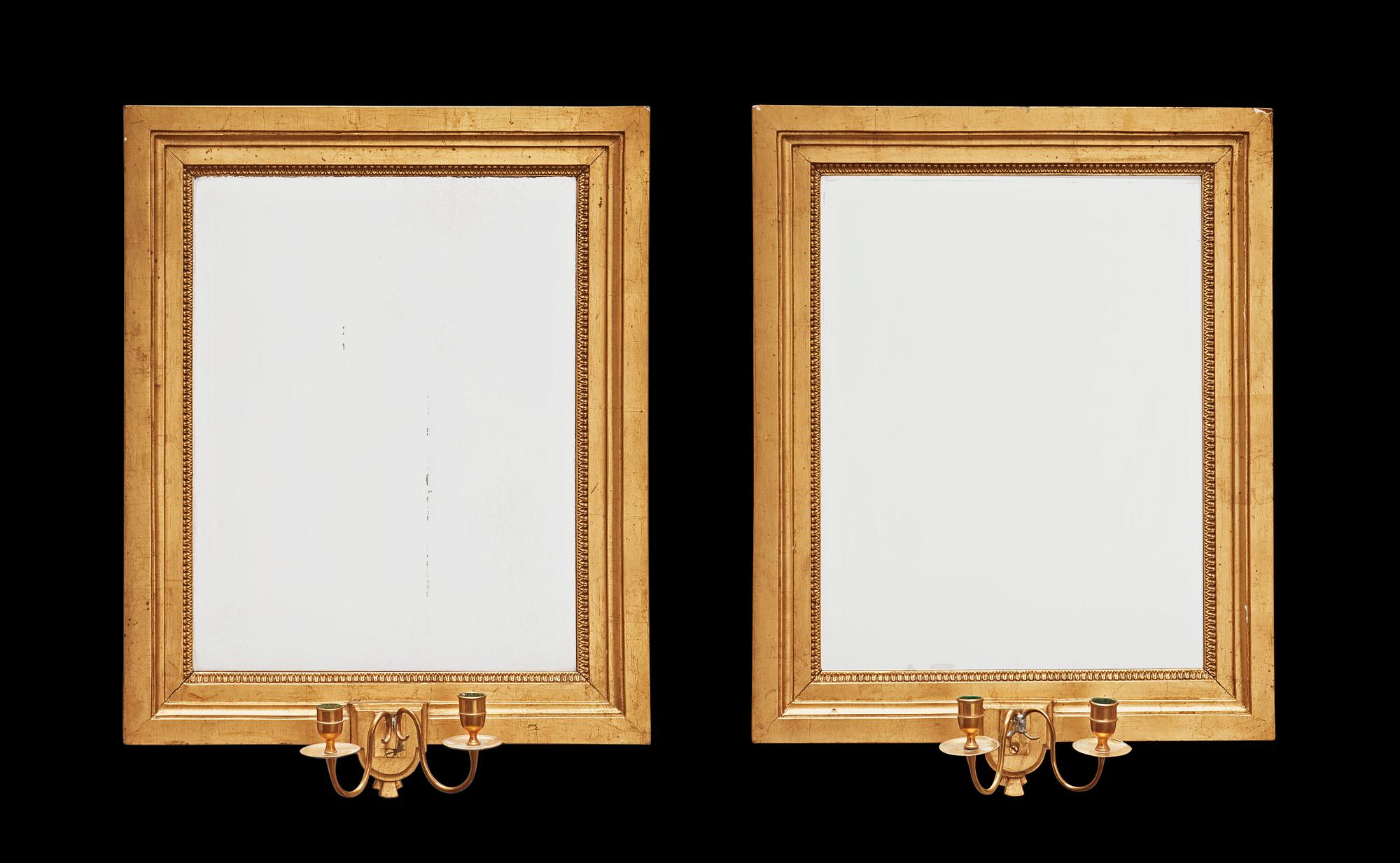 A pair of late Gustavian two-light girandole mirrors by I G Egelström, master 1790.
