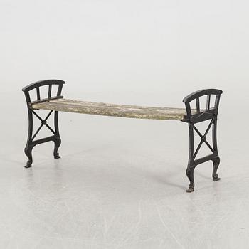 FOLKE BENSOW, a cast iron garden bench.