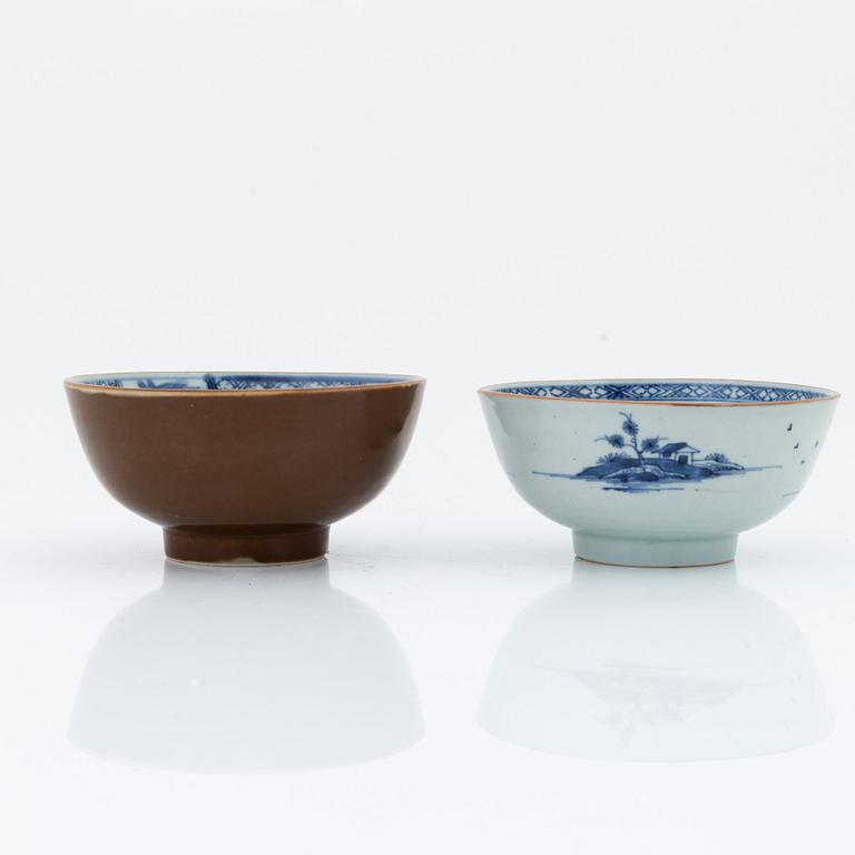 Two blue and white bowls, and a cup with two stands, Qing dynasty, 18th Century.