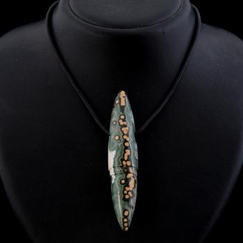 A BERND MUNSTEINER PENDANT, "Symbolon", cut jasper, leather.