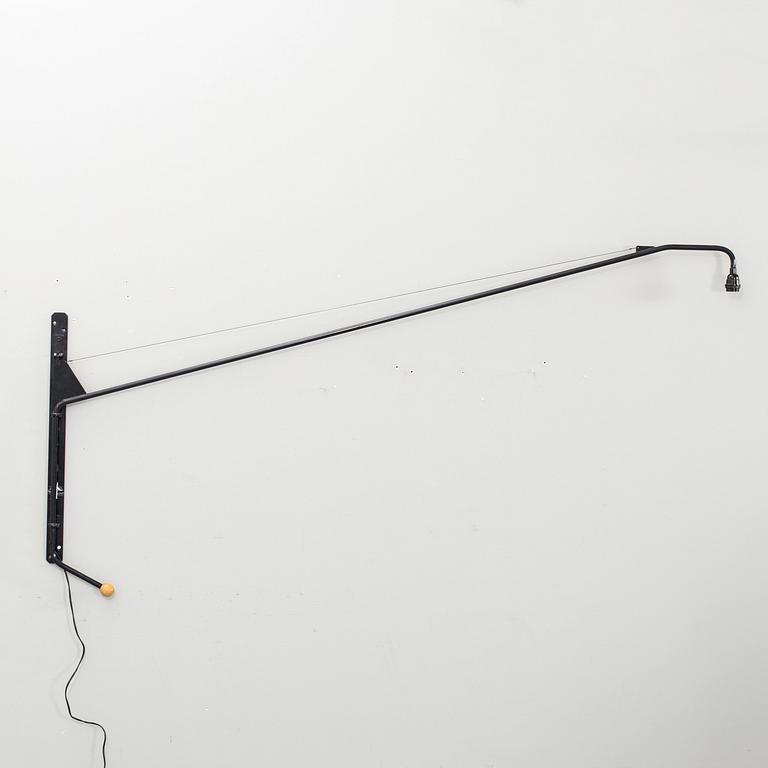 A WALL LAMP BY JEAN PROUVÉ, VITRA.