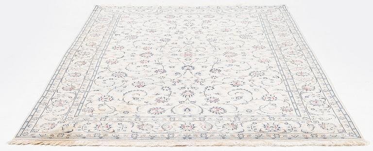 Rug, Nain, part silk, latter part of the 20th century, 293 x 198 cm.