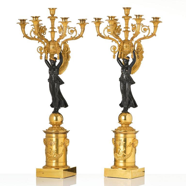 A pair of important six light Empire candelabra.