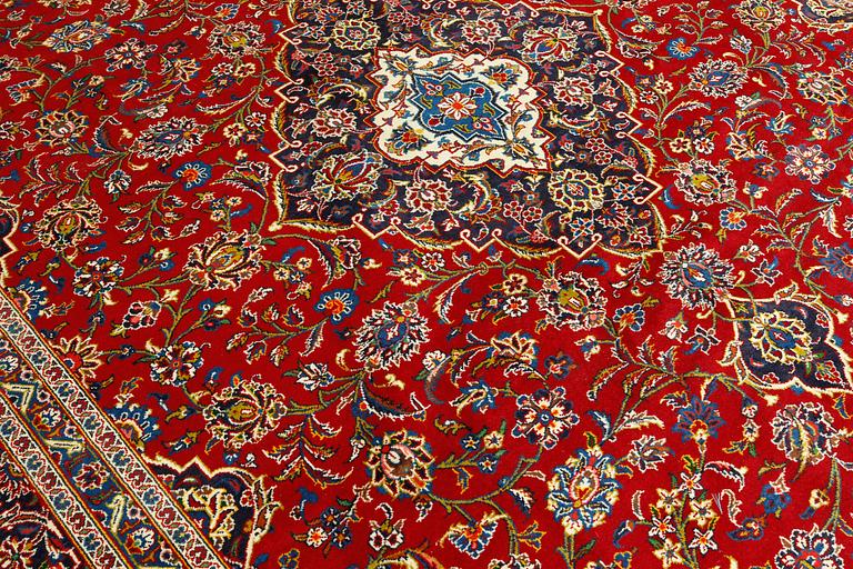 A Keshan carpet, 398 x 298 cm.