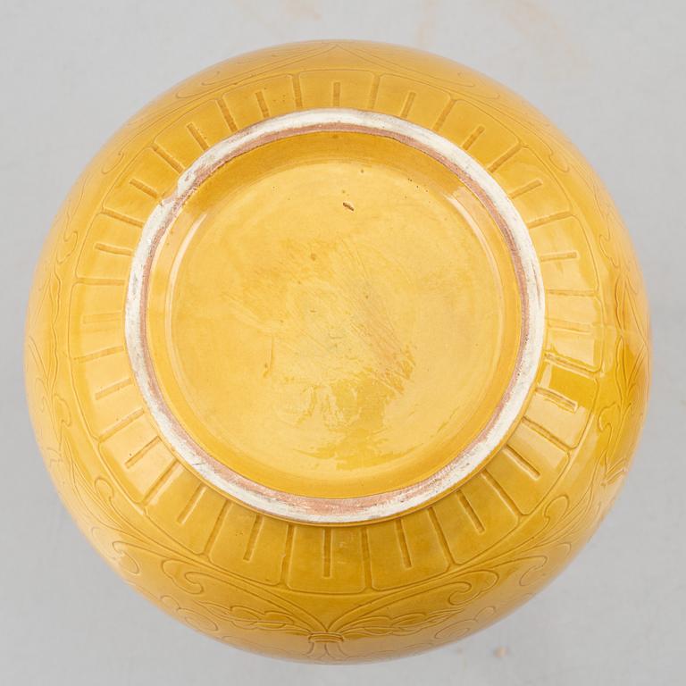 Two Chinese yellow glazed ceramic vases, 20th century.