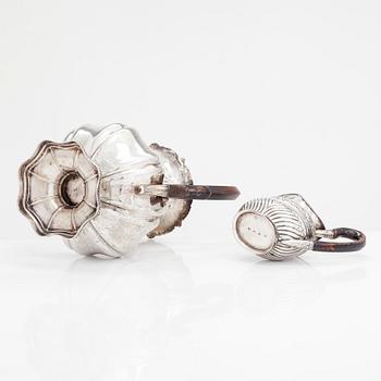 A silver coffee pot, and silver cream jug, Olof Robert Lundgren, Turku 1847 and Fredrik Strömsten, Helsinki 1839.