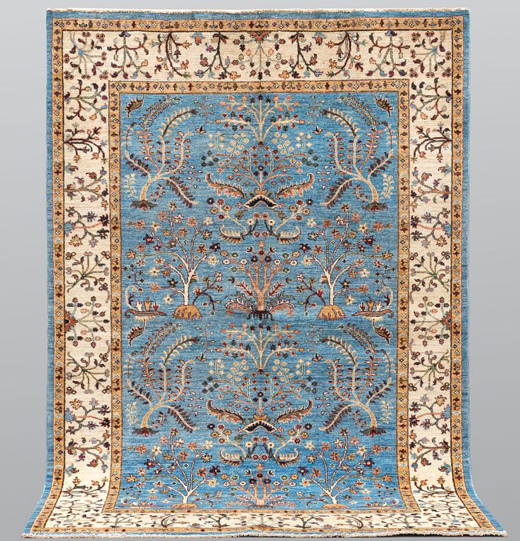 A rug, Ziegler Design, ca 239 x 164 cm.