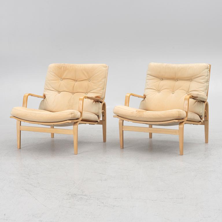 Bruno Mathsson, a pair of 'Ingrid' armchairs, Dux.