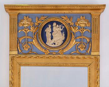 An early 20th Century Gustavian style mirror with a console table.