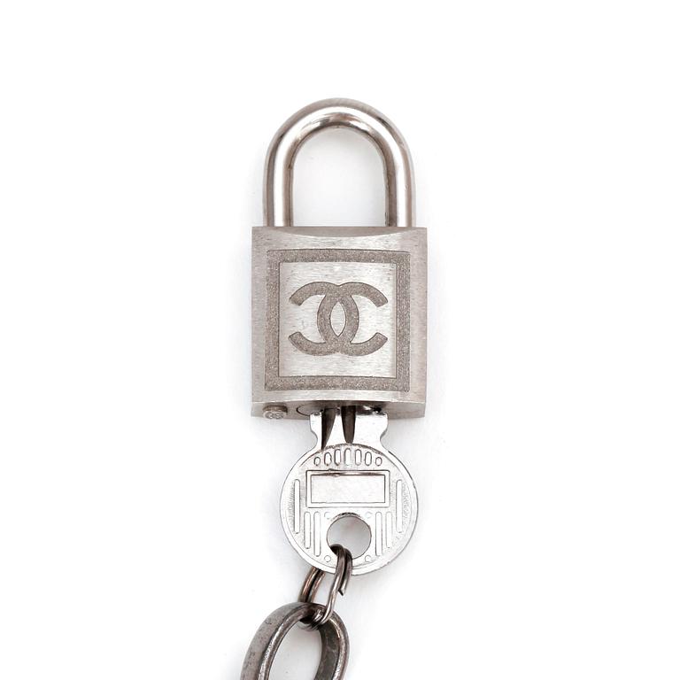 CHANEL, a chain belt.