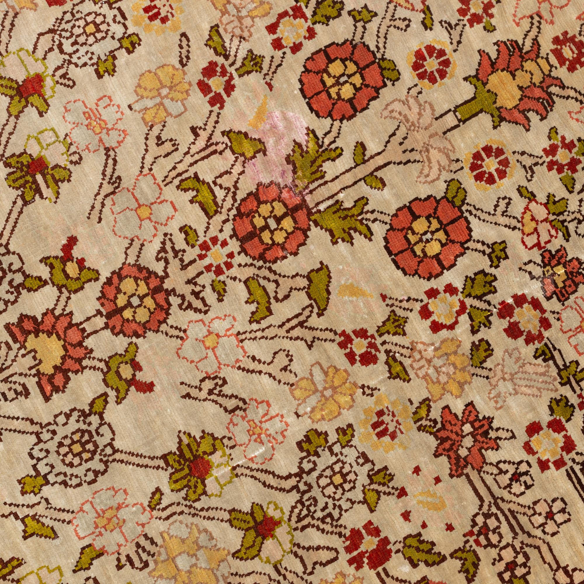 A Hereke silk rug, c. 130 x 87 cm.