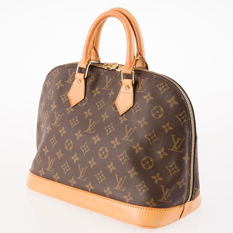 LOUIS VUITTON Monogram Canvas Alma Hand Bag.