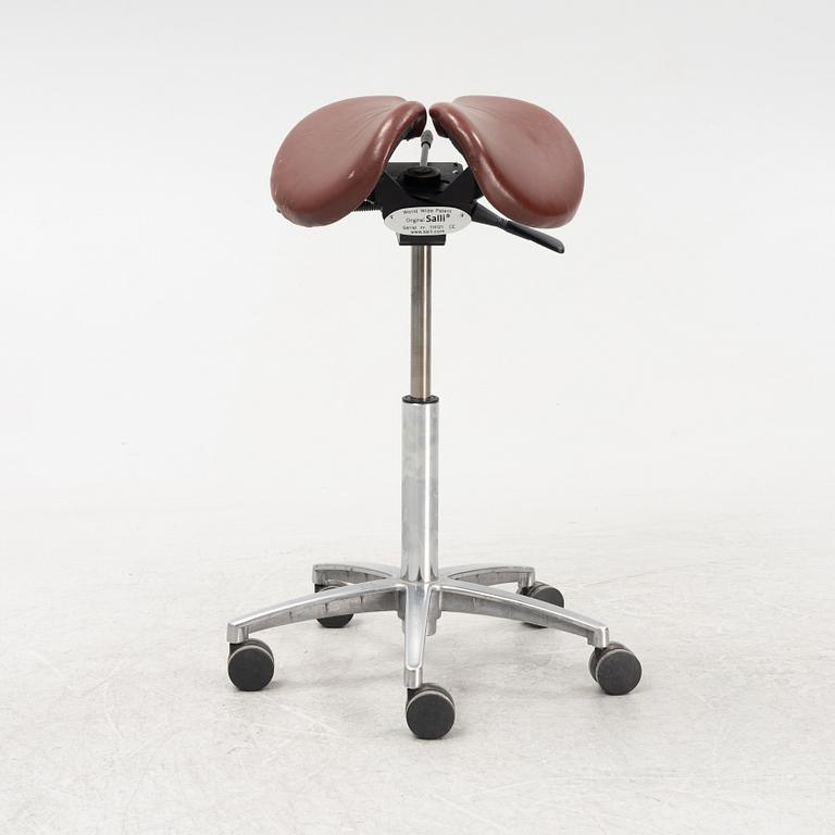 A 21 st century saddle stool from Salli, Finland.