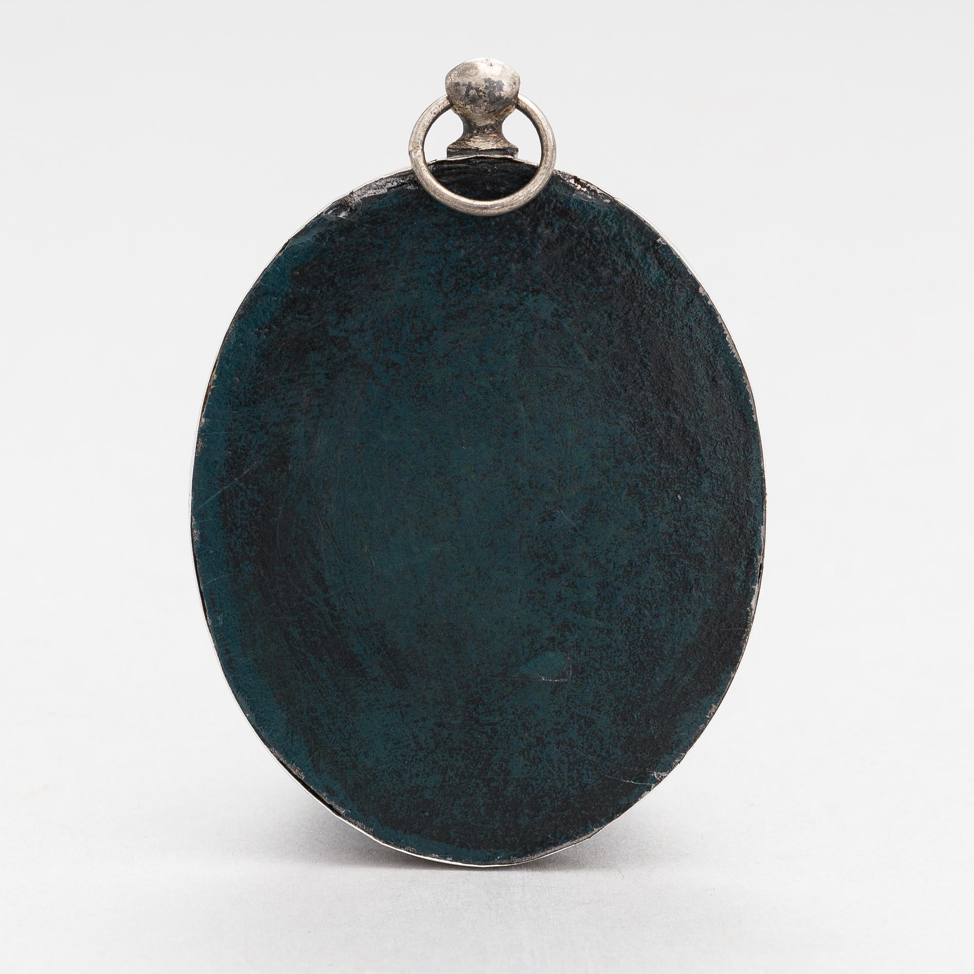 A silver and mother-of-pearl icon, Russian import mark, Moscow 1908-17.